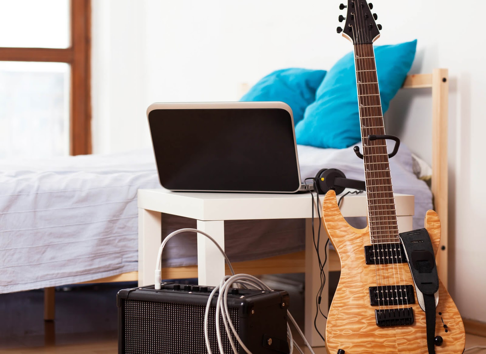 Electric guitar in bedroom