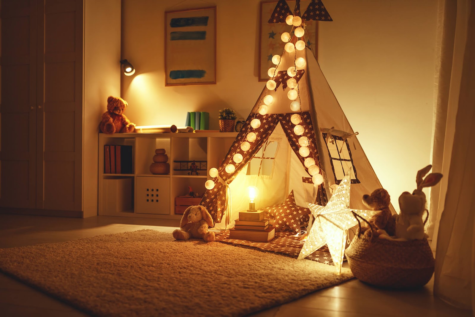 Child's room with night lights around teepee