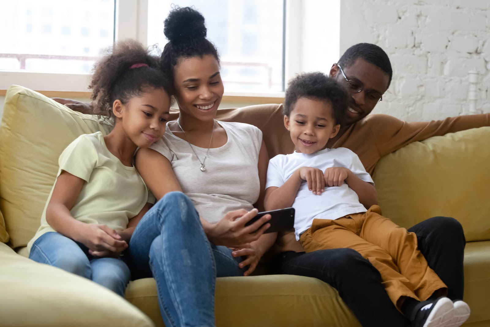 Family spending time together on the couch