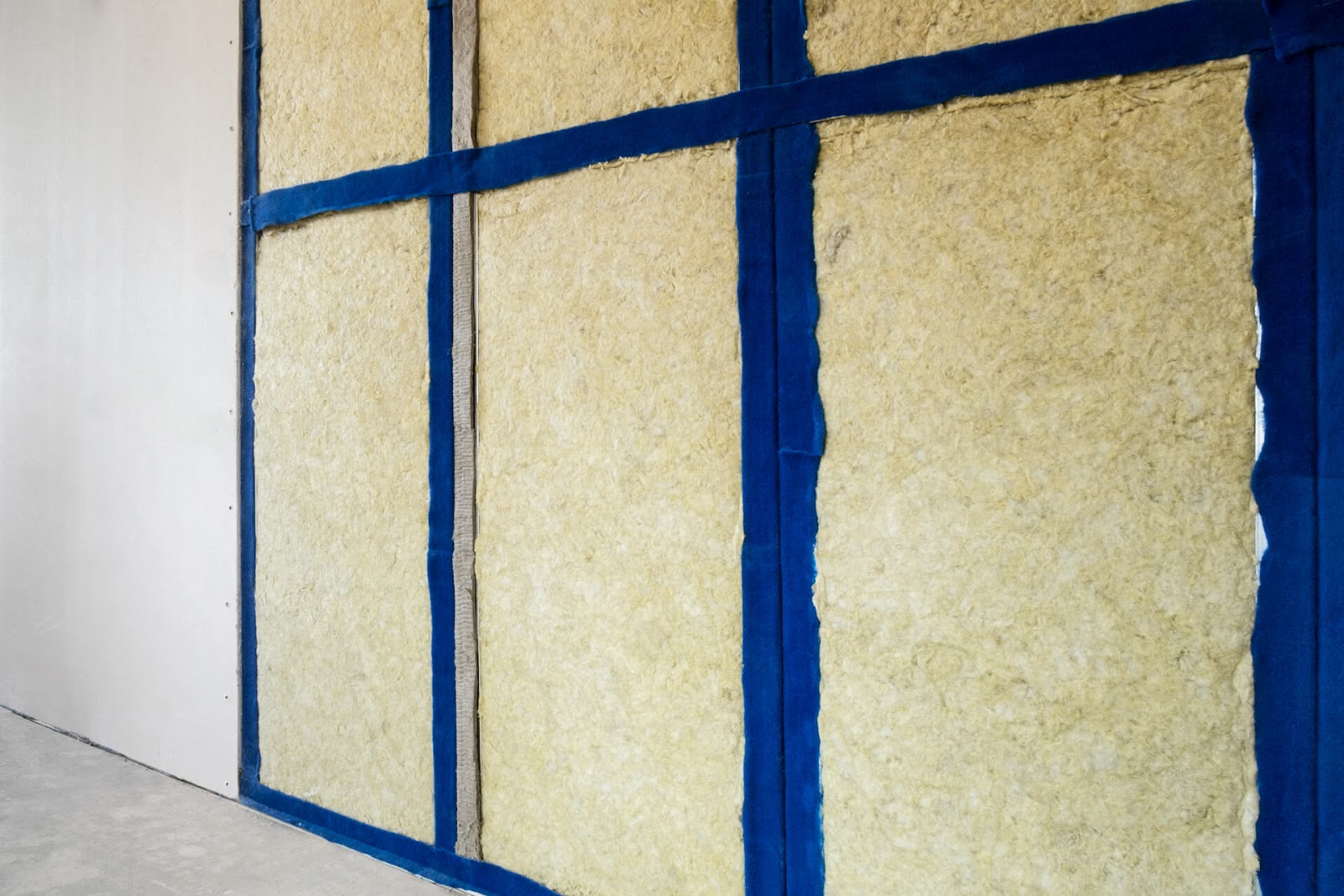 Insulation between drywall