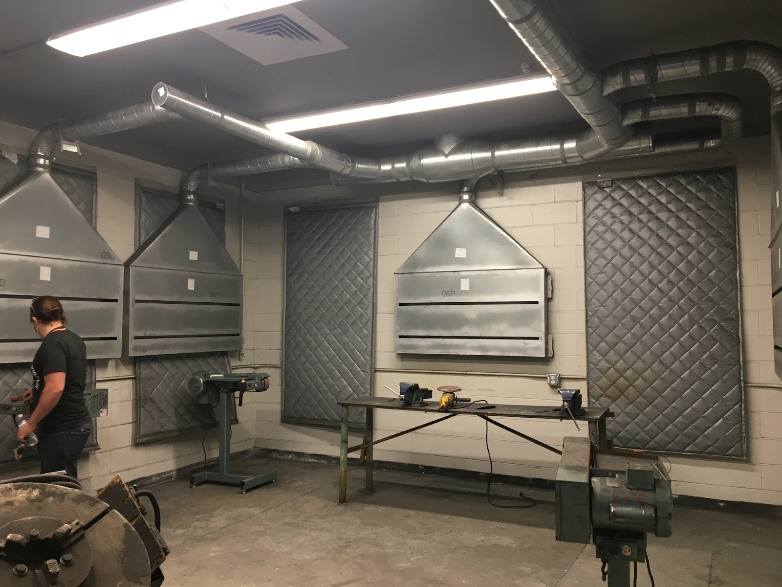 Garage with hanging acoustic blankets