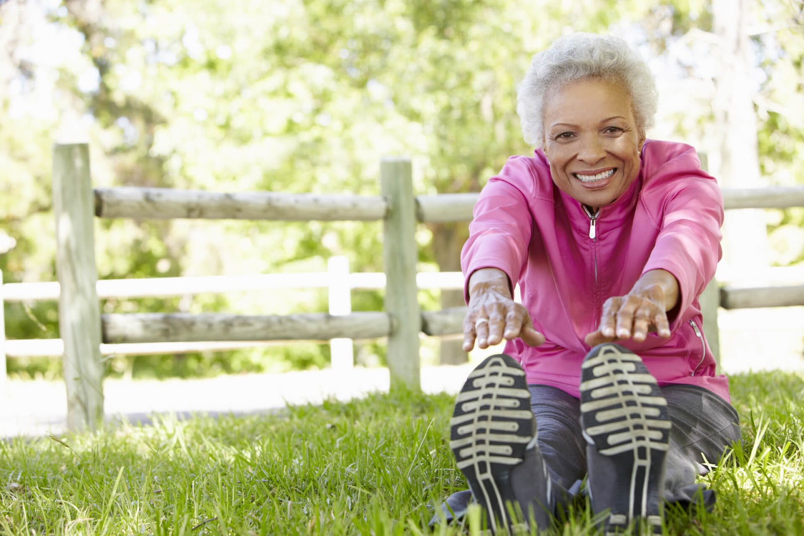 Senior Woman stretching outisde
