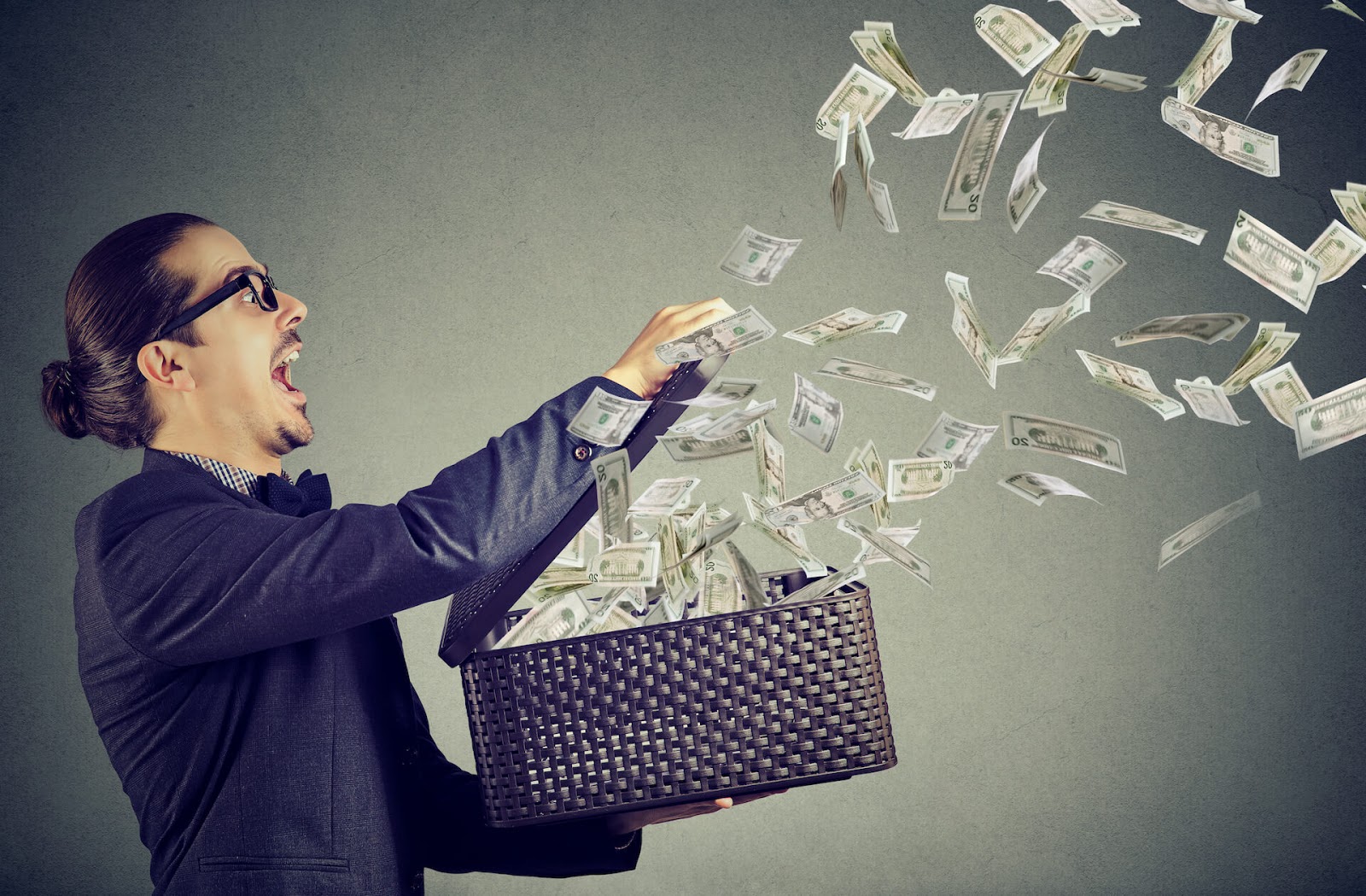 Man throwing money around