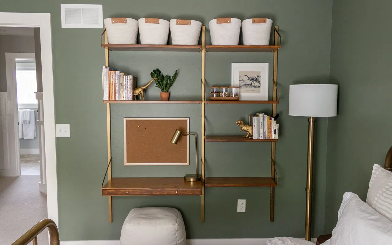 Galvanized bookshelves turned into a wall desk / command center