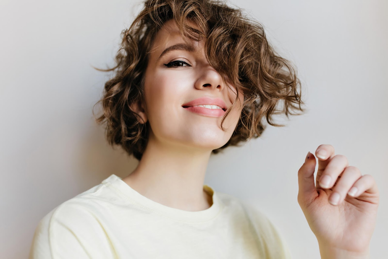 Woman feeling fierce in her curly hair