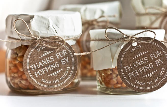 Popcorn kernels in jars with "thanks for popping by" gift tag