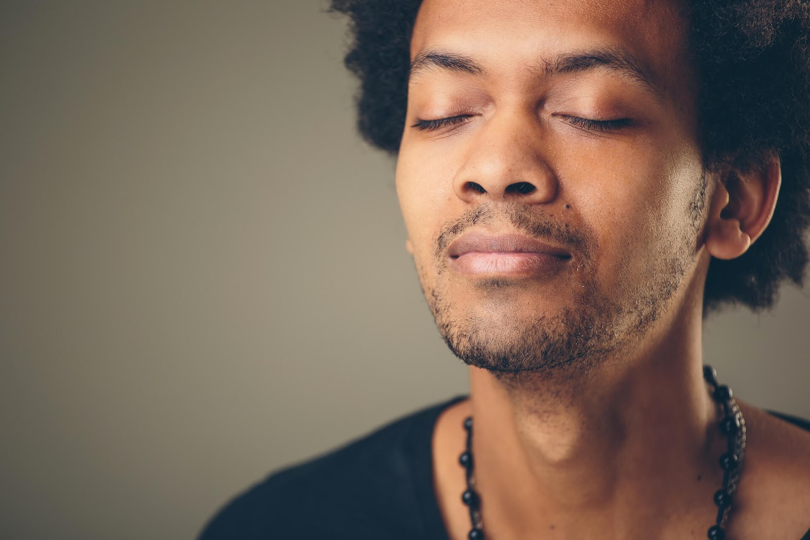 Man inhaling peacefully