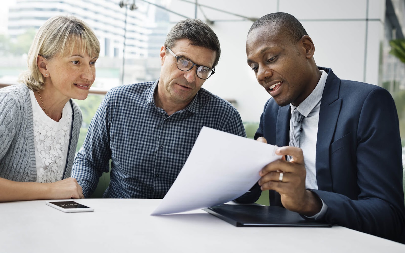 Man looking over some insurance options together