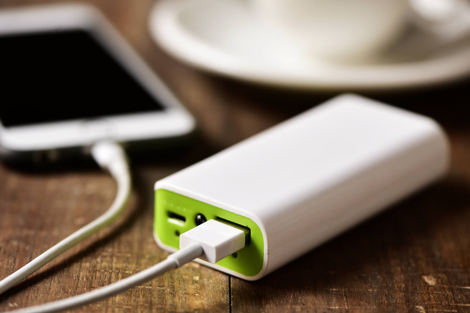 Close up of phone plugged into a battery pack