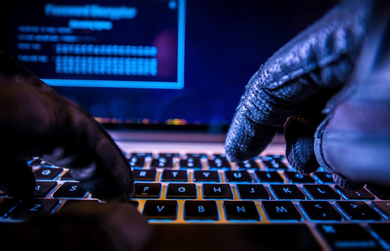 Gloved hand hacking into someone's database. The scoundrel.