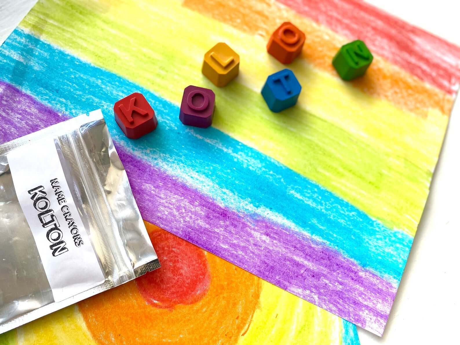Mini blocks crayons that spell out Kolton