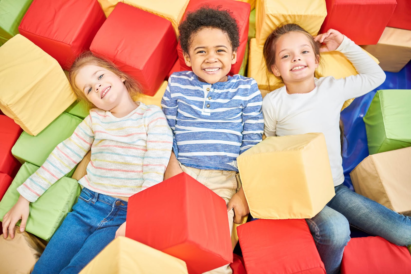 Kids enjoying a foam pit at a birthday party