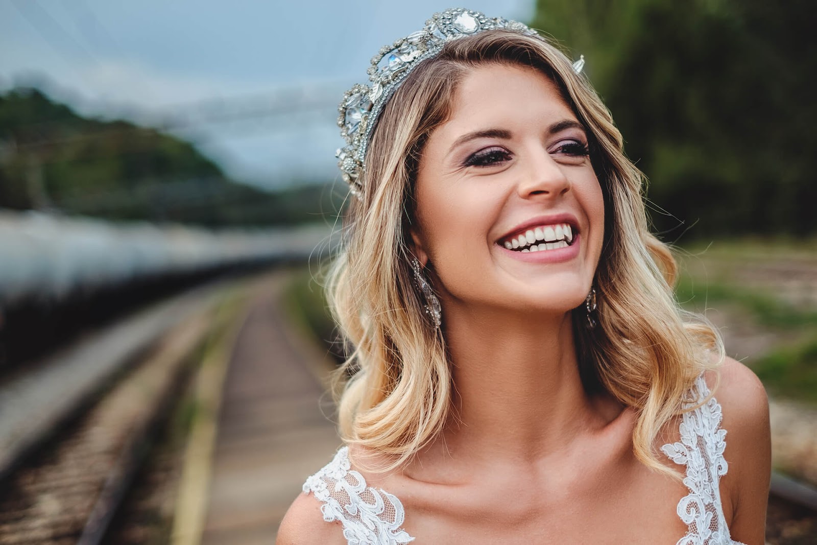 Bride wearing a tiara and smiling