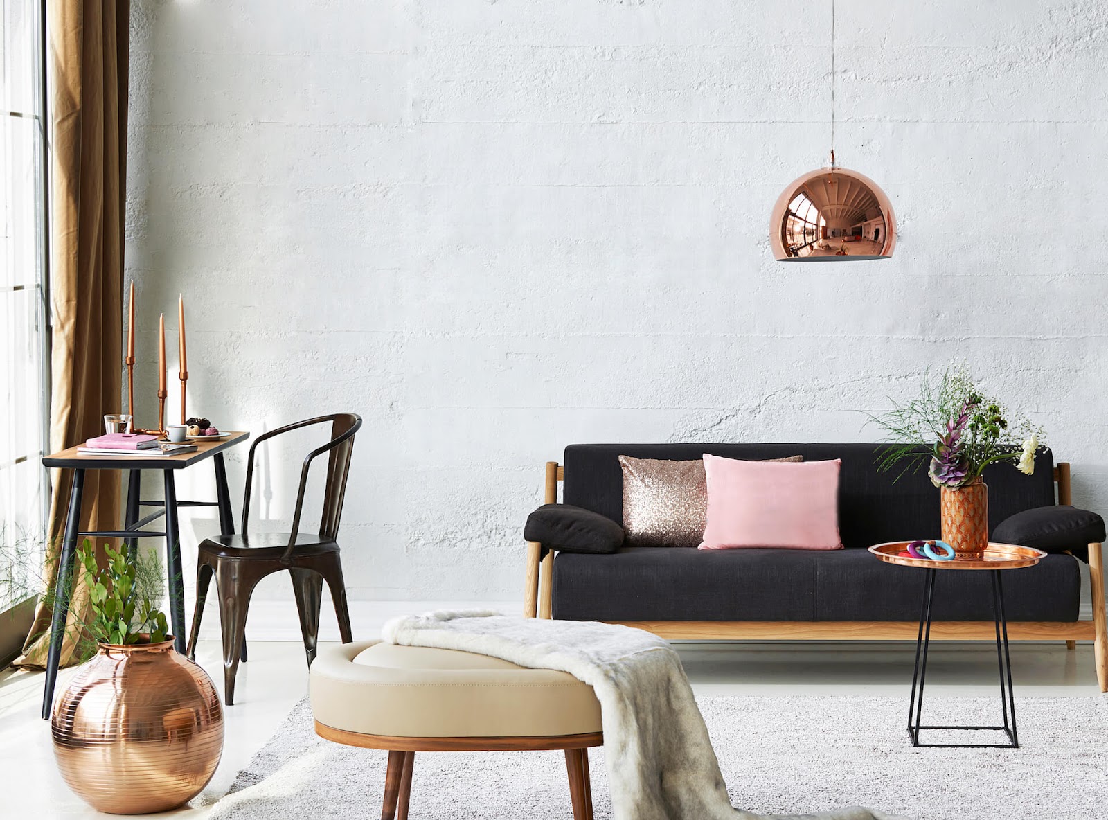 Stylish living room with bronze metal pendant ceiling light