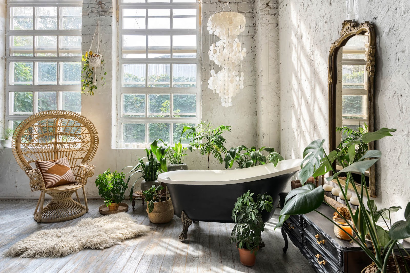 Shell chandelier over tub in bathroom
