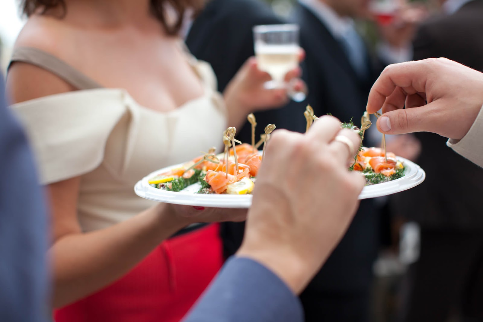Caterer passing out appetizers