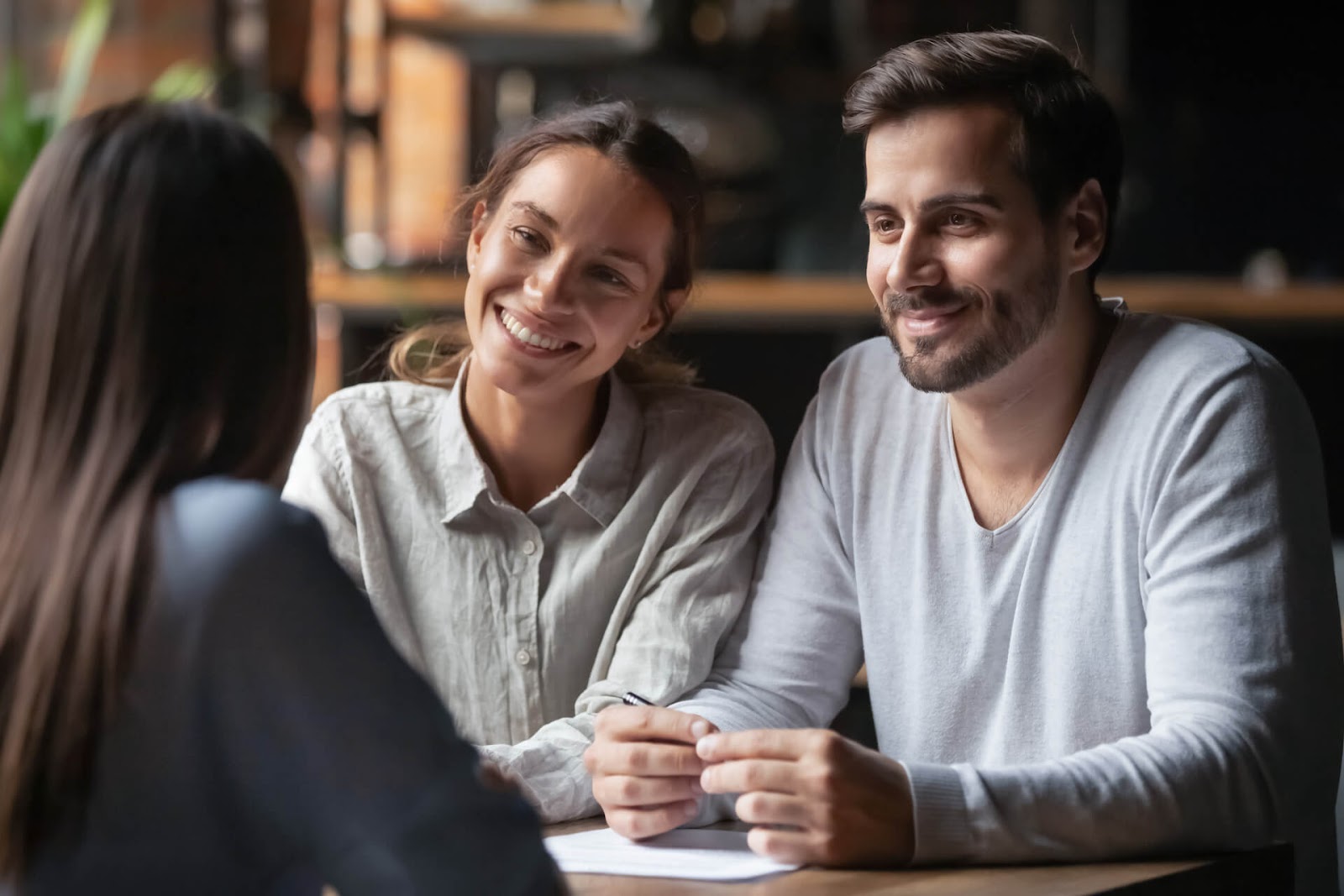Man and woman talking with caterer