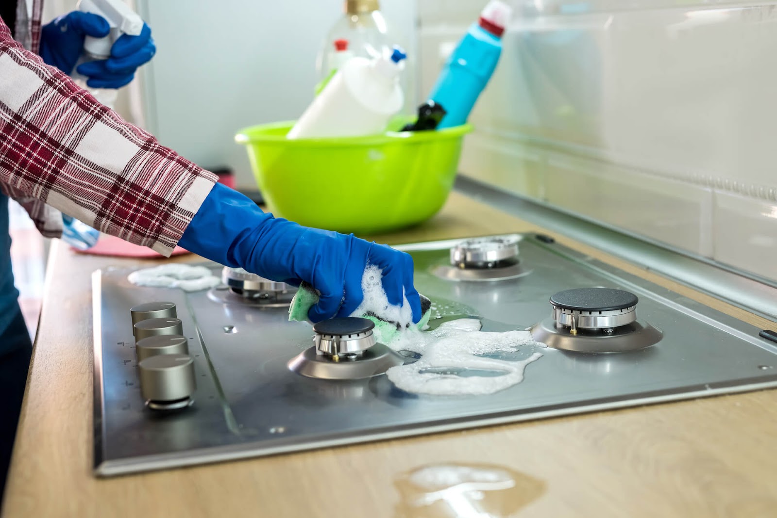 hand scrubbing an oven