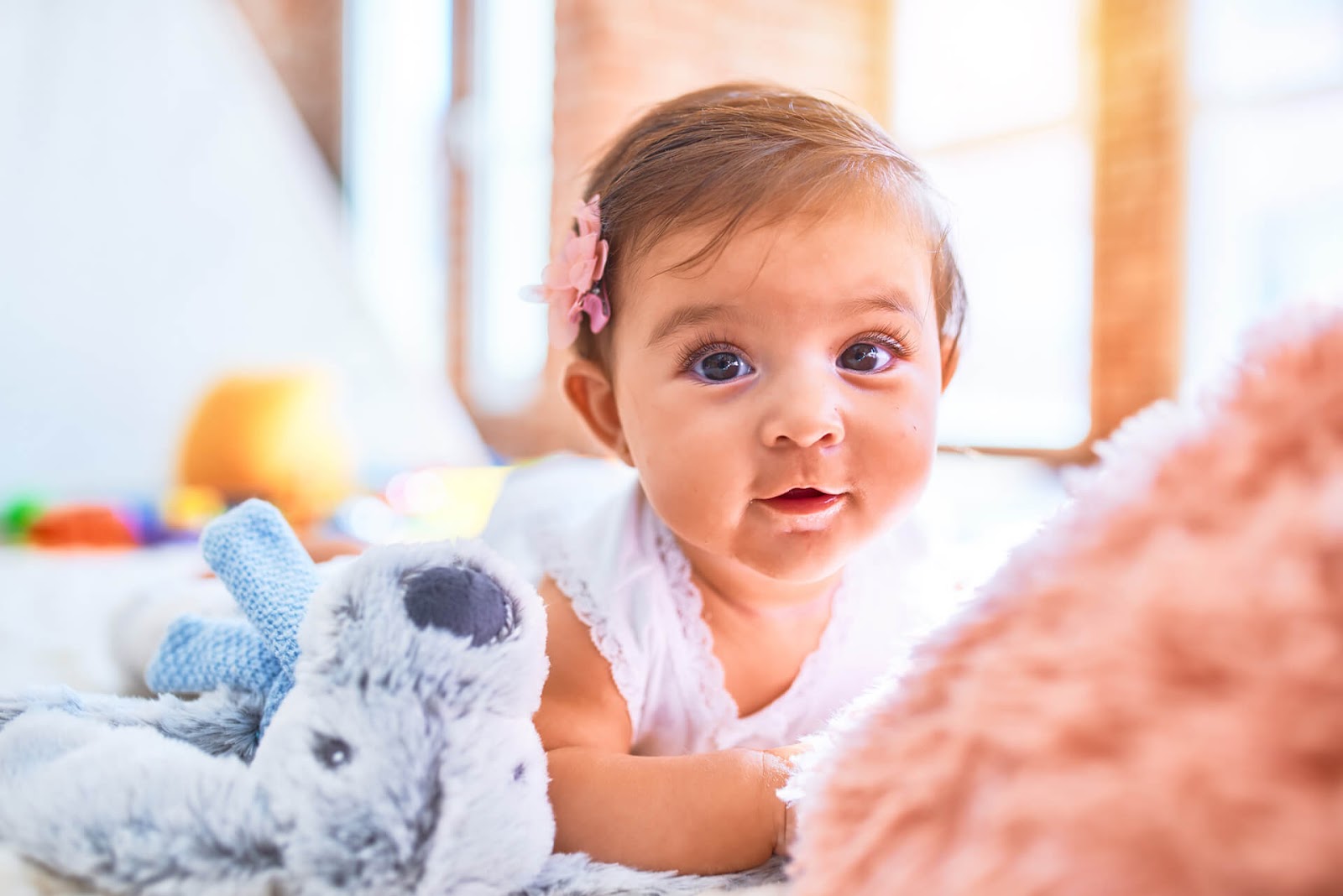Brown eyed baby girl looking at the camera