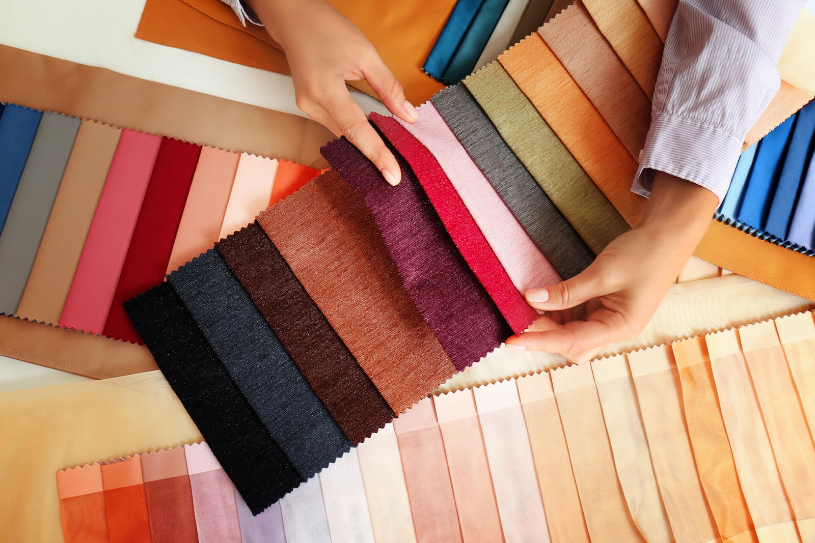 Woman looking at fabric swatches