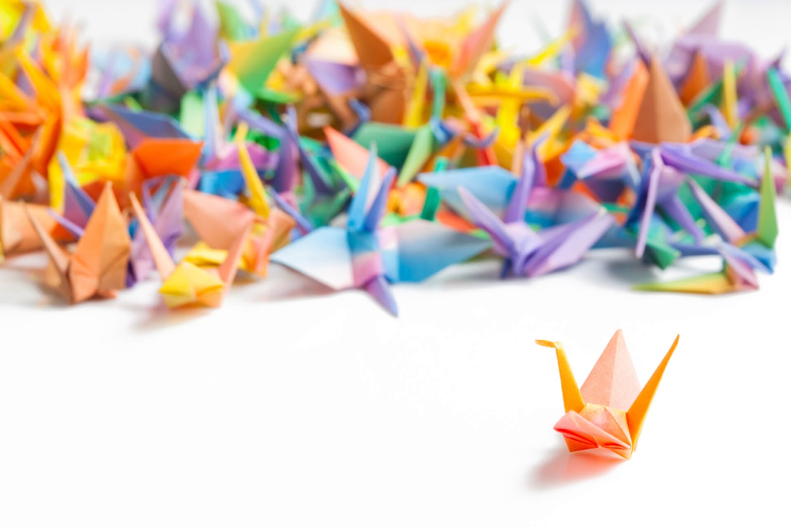 A whole bunch of colorful origami swans