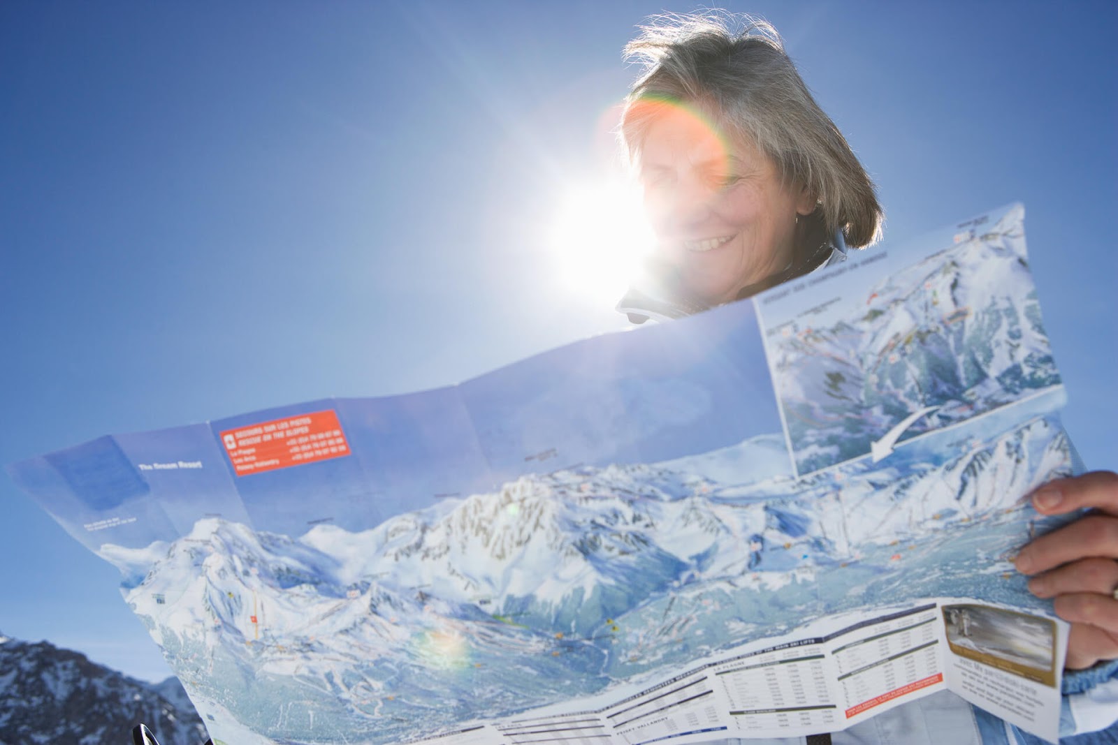 Woman looking at a trail map