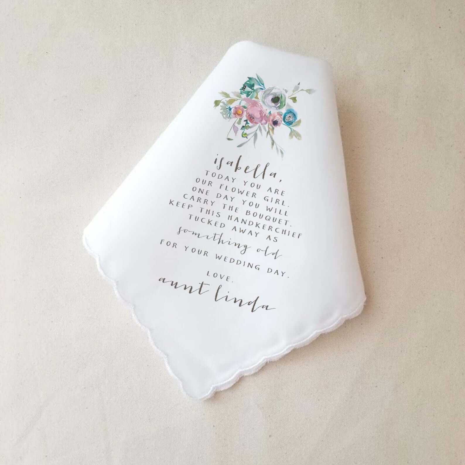 Beautiful printed handkerchief that points to the flower girl's future wedding day'