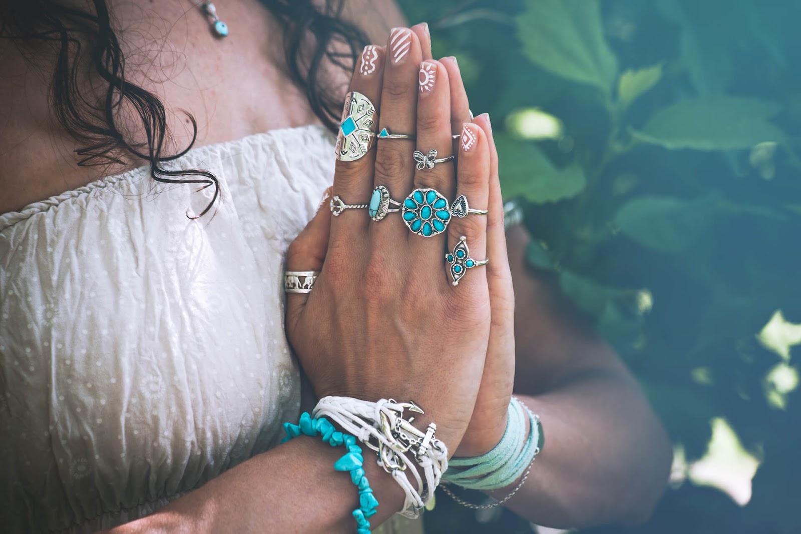 Close op of woman's hands as she meditates