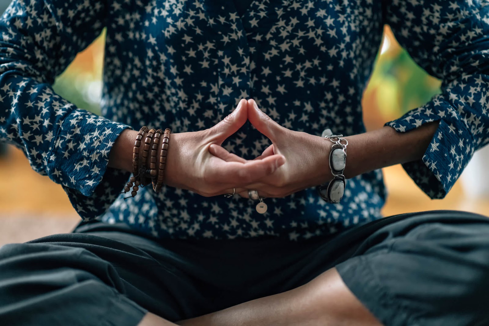 Hand placement to open your throat chakra