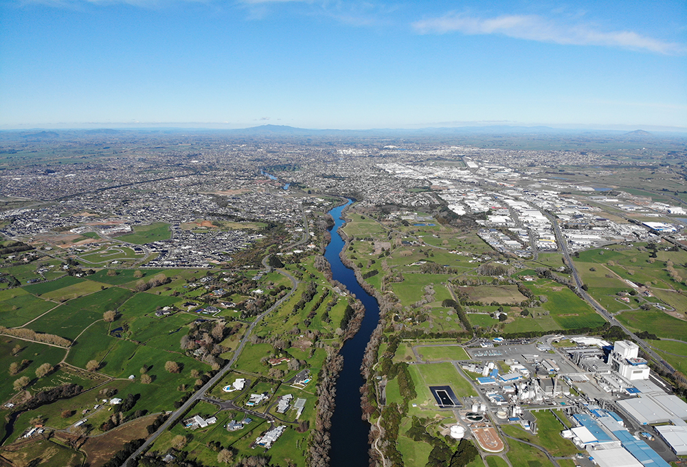 Aerial view of Waikato River Trail in New Zealand showing change in urban density