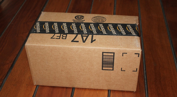 Amazon package on wooden floor