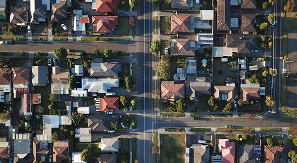 Aerial view of streets going through a suburban neighborhood