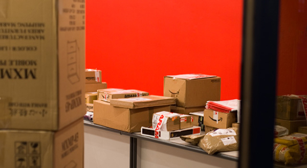 Red room with packages on a counter