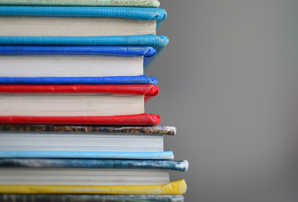 stack of books with colorful covers