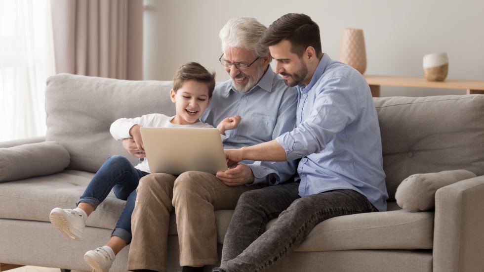 Kid and parent on couch with parent