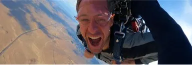 Employee skydiving with their Blueboard reward.