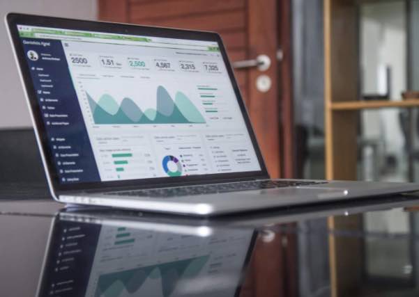 A laptop showing operations finances