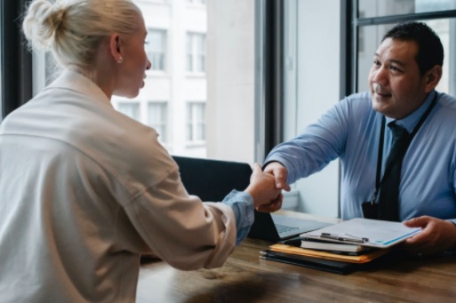 HR professional welcoming a new candidate