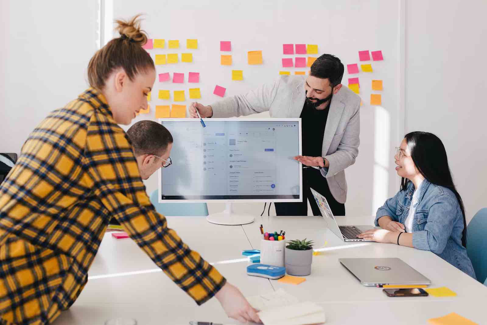 A man leading his HR team