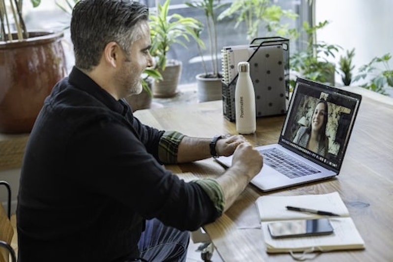 A man onboarding on his personal computer
