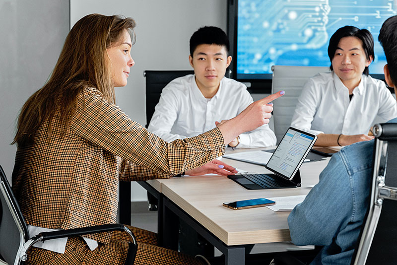 Manager assigning tasks to team