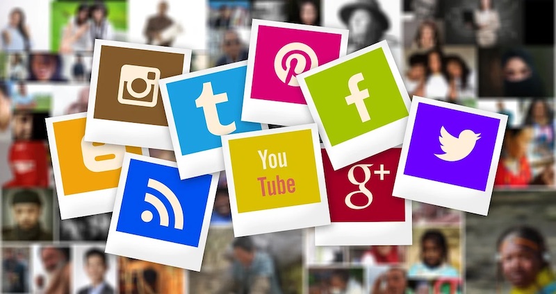 Several polaroid photos of social media icons bunched together
