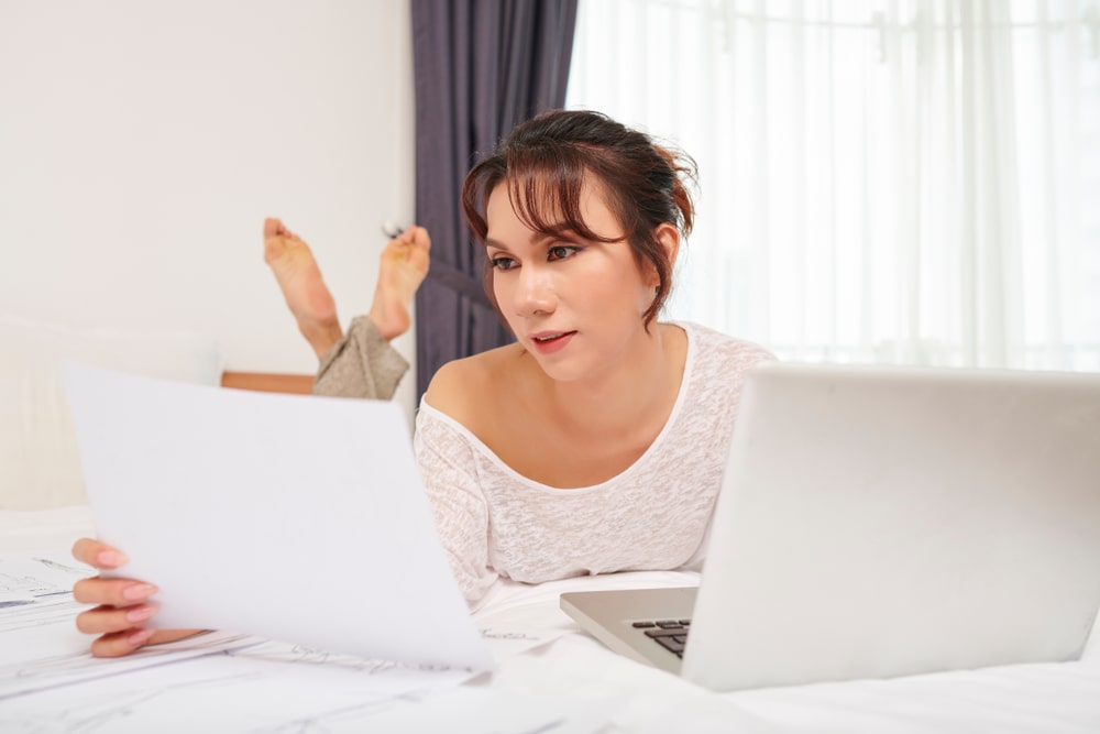 Transgender Woman Working Productively at Home