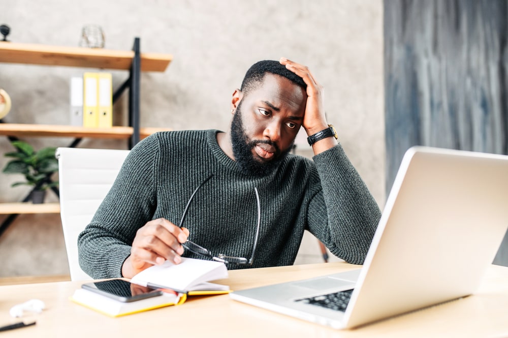 Man Frustrated with Marketing Tasks