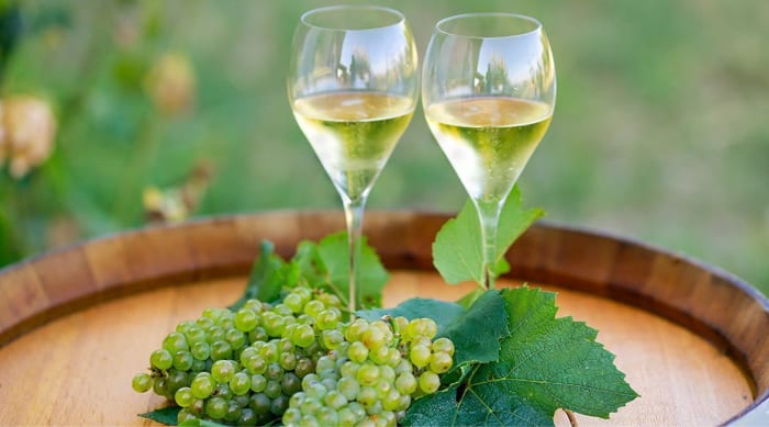 How does the fermentation process influence the flavors of Chardonnay?