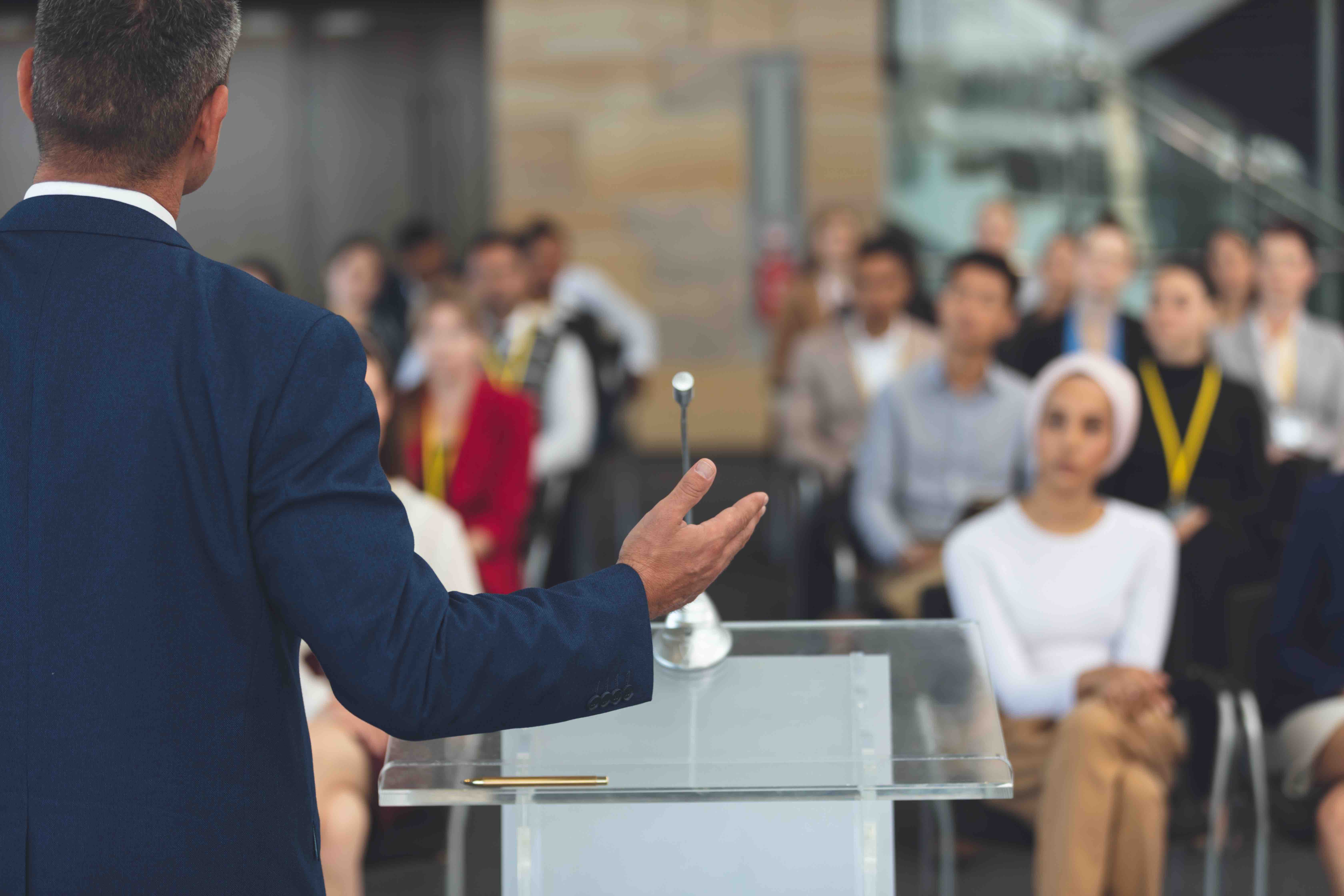 Businessman talking to a group of people
