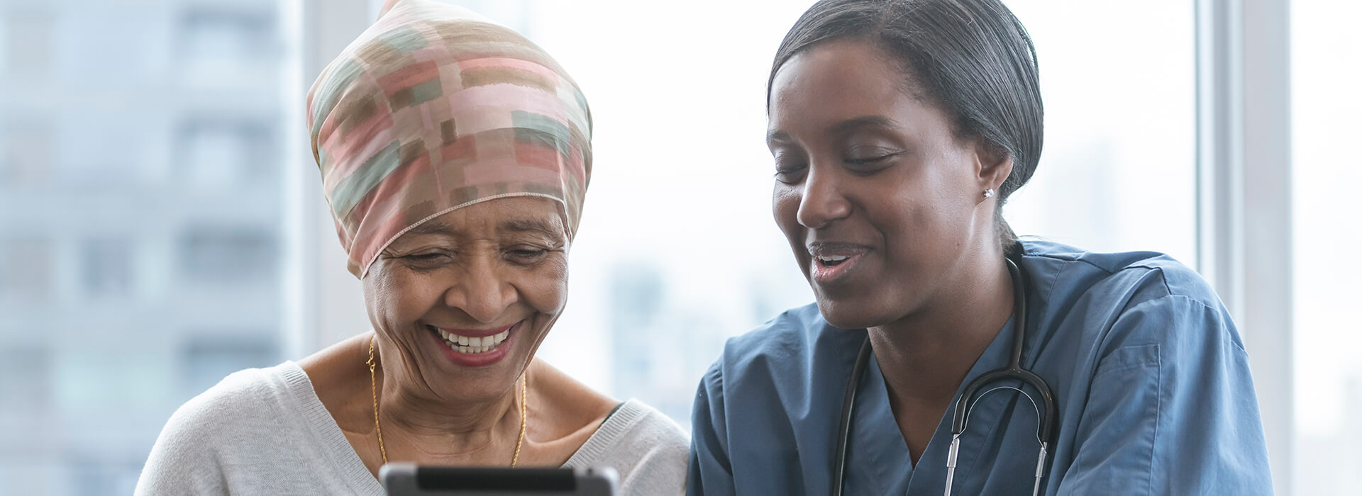 healthcare professional educating a patient about body donation to science