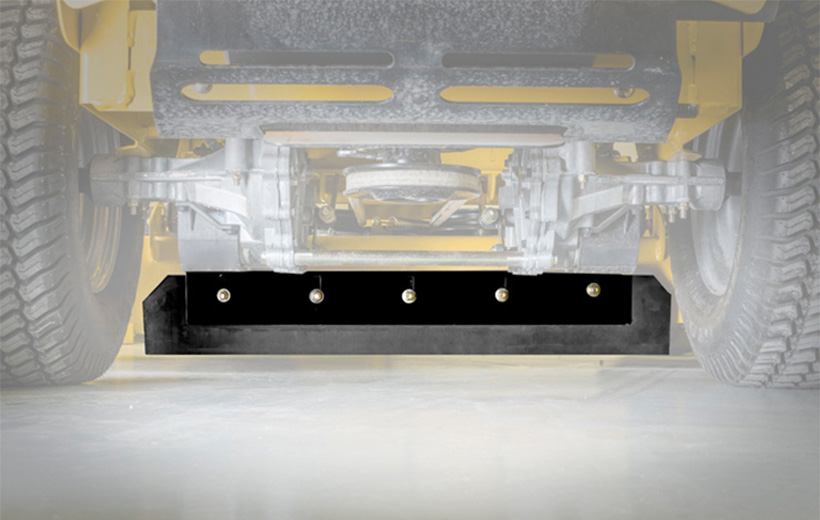 Image of a black rubber rectangular flap mounted under a mower
