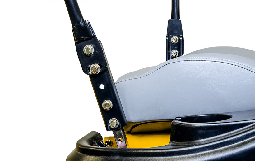 Image of black metal extension added on steering bar of mower