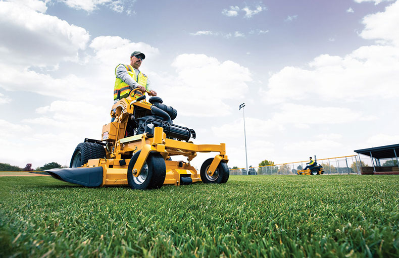 Image of a yellow zero turn mower on a white background